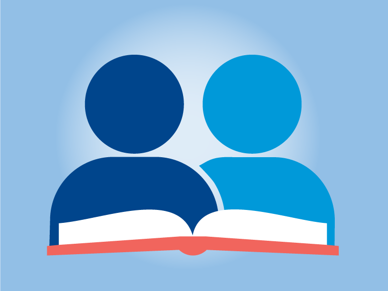 Silhouettes of two individuals with a book