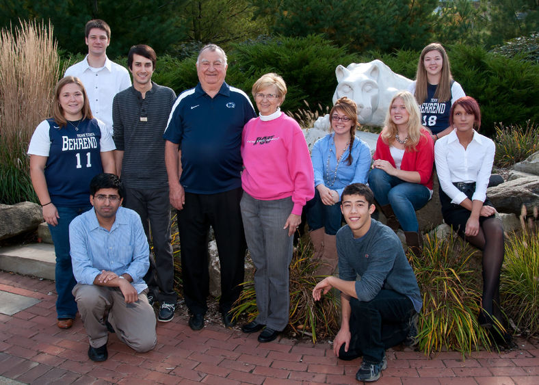 Joe and Isabel Prischak pose with scholarship recipients at the Lion Shrine at Penn State Behrend.